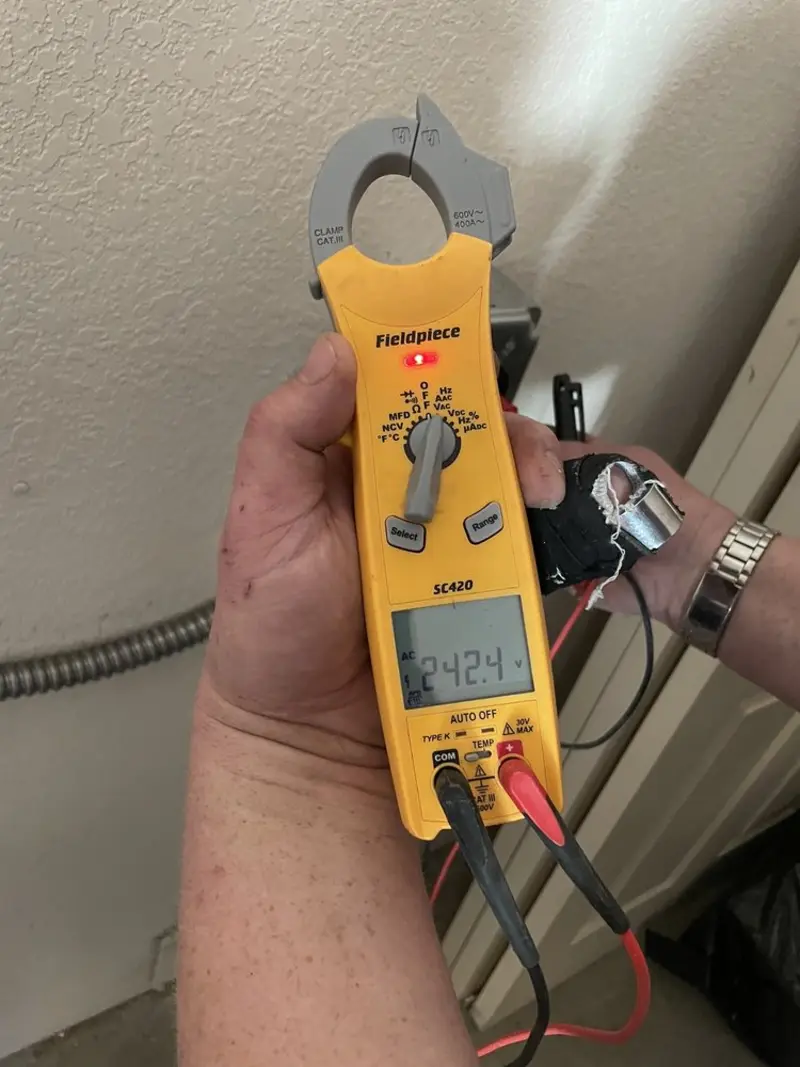 Voltage testing with clamp meter during Generator Installation in Belfair